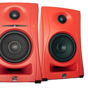 Pair of red Kali Audio LP-UNF desktop speakers