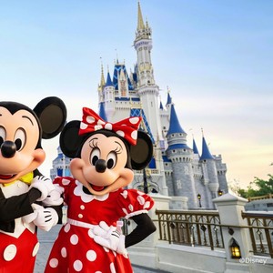 Mickey and Minnie Mouse in front of Cinderella Castle at Walt Disney World
