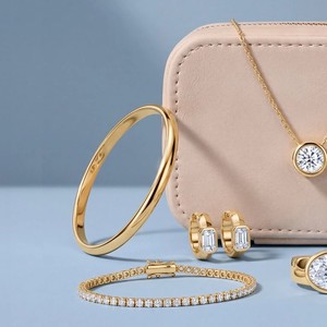 Pompeii3 gold bangle, diamond tennis bracelet, bezel hoops and pendant from the Classic Capsule