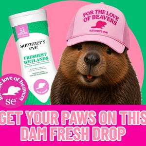 Summer's Eve Freshest Wetlands wash bottle next to a beaver wearing a pink Summer's Eve hat